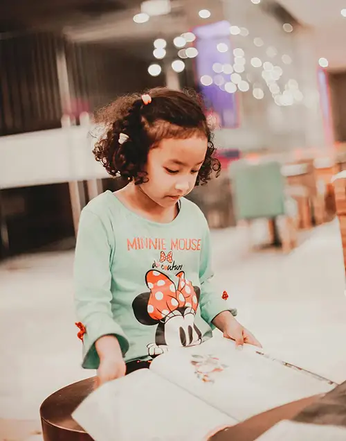 Girl-Reading-in-Cafe-m Girl Reading in Cafe