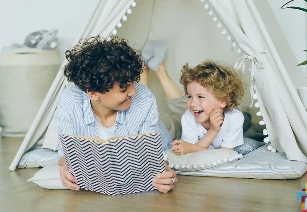 A mother reading with her son